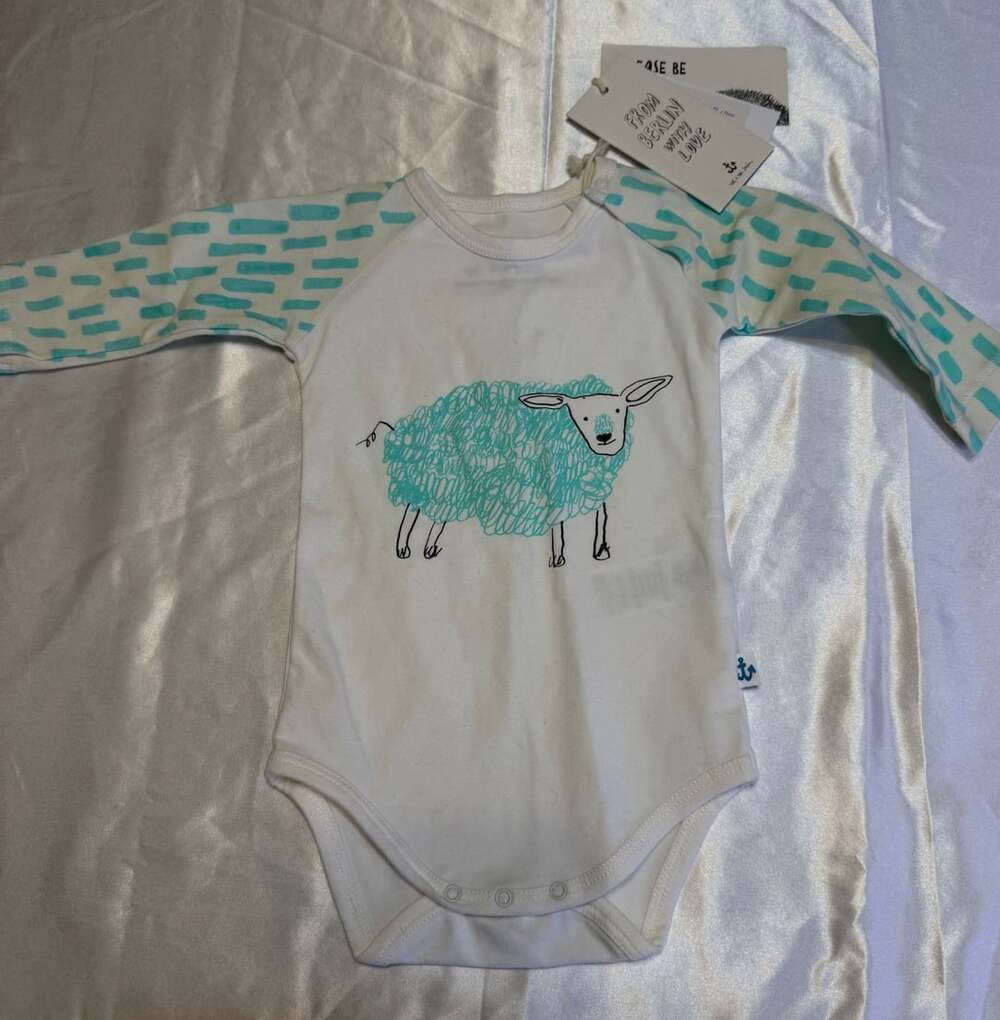 NoΓ© & ZoΓ« Berlin Ice Rain Sheep Graphic Print Long Sleeve Raglan Baby Bodysuit